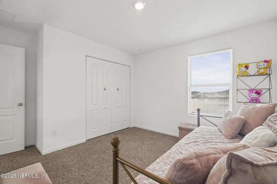 Furnished interior view inside a new home in Entrada, St. Augustine (Image 38).