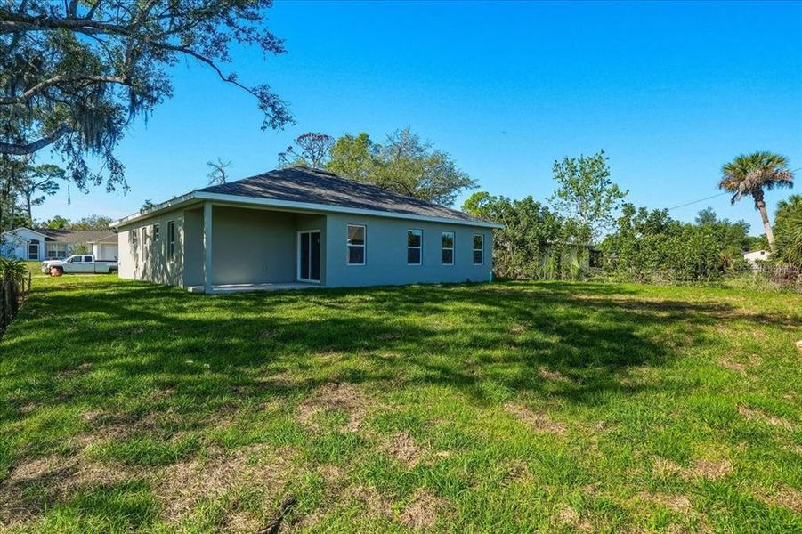 Exterior details and patio area of a home in , Port Charlotte (Image 29).