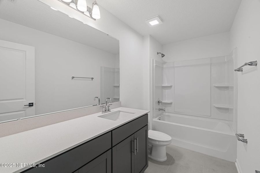 Furnished interior view inside a new home in Beacon Lake, St. Augustine (Image 10).