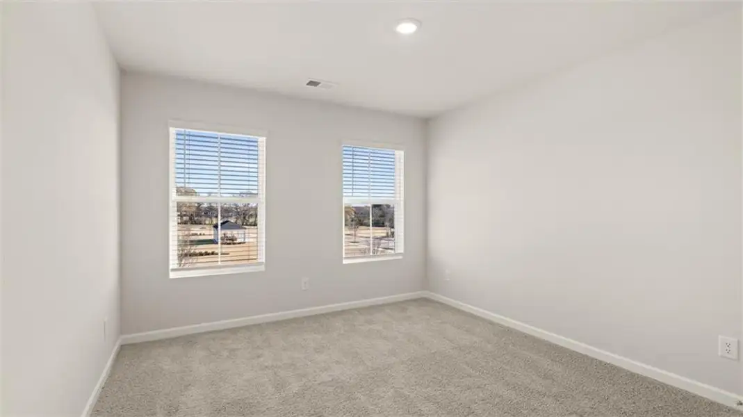 Spacious, unfurnished interior of a new home in Brookland Commons, Monroe (Image 22).