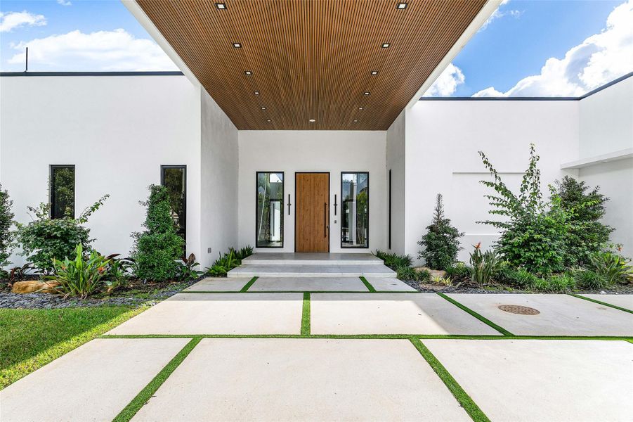 Exterior details and patio area of a home in , Parkland (Image 38).