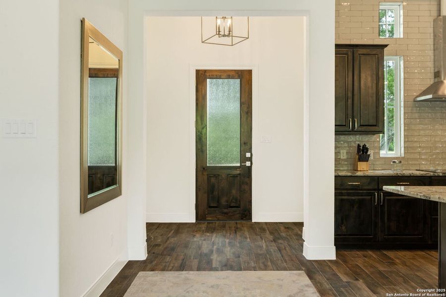 Furnished interior view inside a new home in Alamo Estates, San Antonio (Image 18).