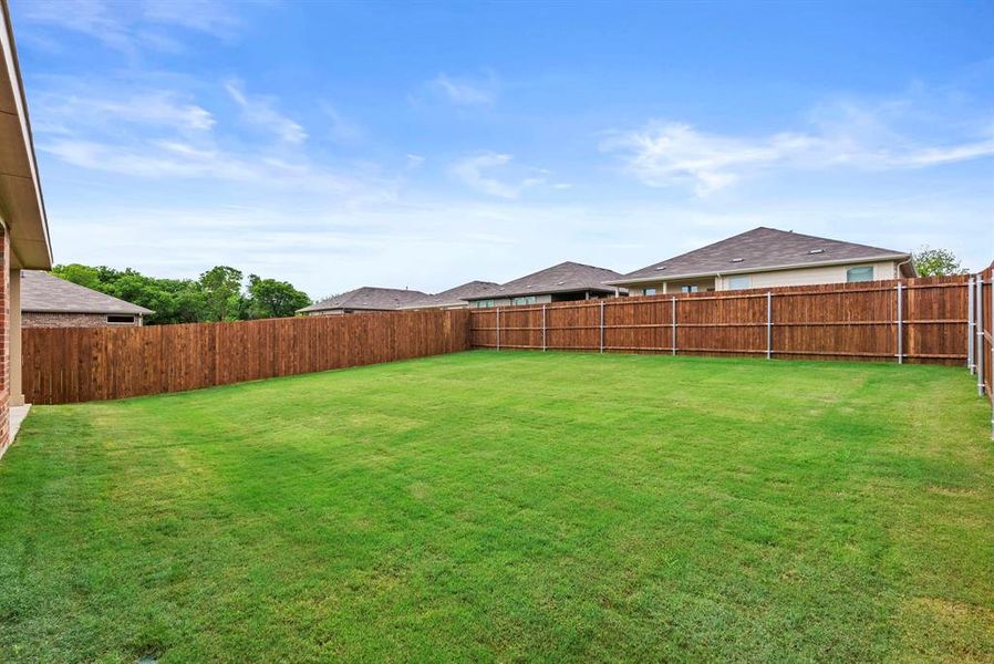 Exterior details and patio area of a home in The Canyons, Keene (Image 2).