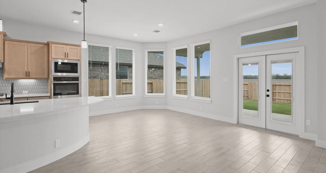 Representative unfurnished interior of a home built from the Gibson by Chesmar Homes in Highland Village, Georgetown (Image 6).