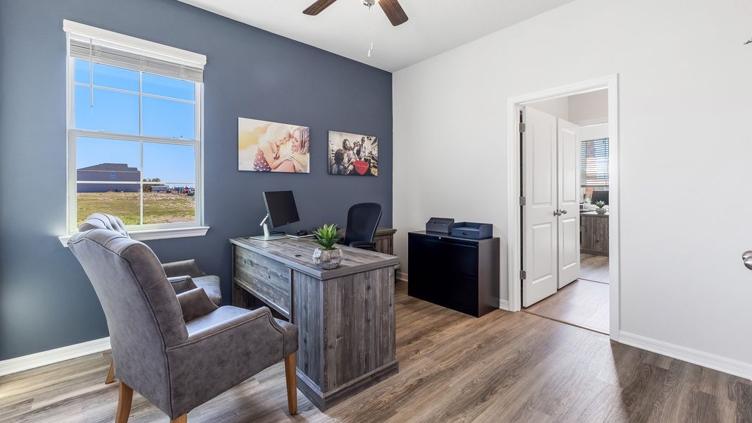 Representative furnished interior of a home built from the Camden by D.R. Horton in Bella Lago, Parrish (Image 25).
