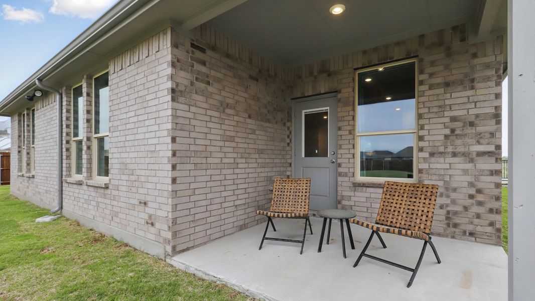 Exterior details and patio area of a home in Saratoga, Granbury (Image 2). Exterior details and patio area of a home in Saratoga, Granbury (Image 2).