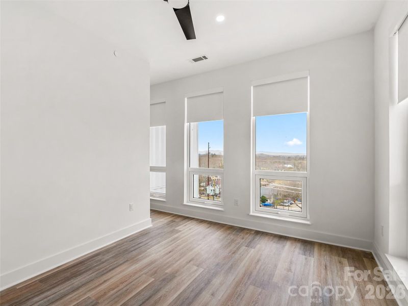 Spacious, unfurnished interior of a new home in , Asheville (Image 25).