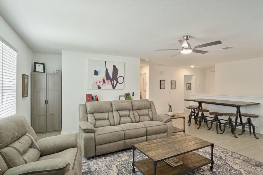 Furnished interior view inside a new home in The Pines At Seven Coves, Willis (Image 37).