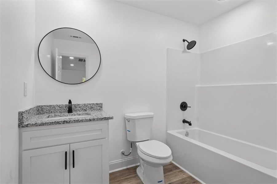 Furnished interior view inside a new home in , Calhoun (Image 9).