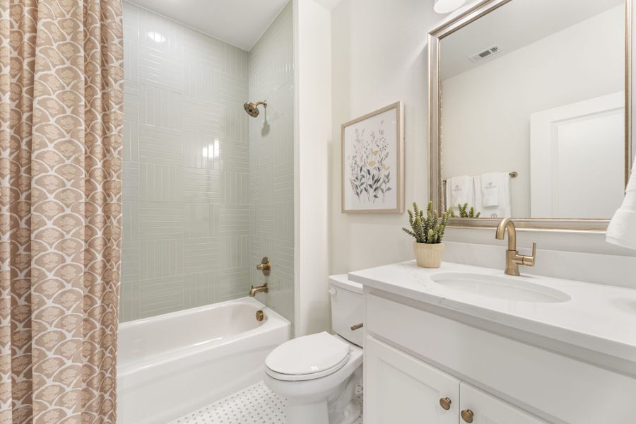 Representative furnished interior of a home built from the 6051 by Tradition Homes in StarView, Prosper (Image 47).