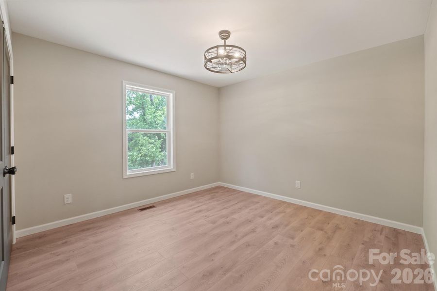 Spacious, unfurnished interior of a new home in , Valdese (Image 24).
