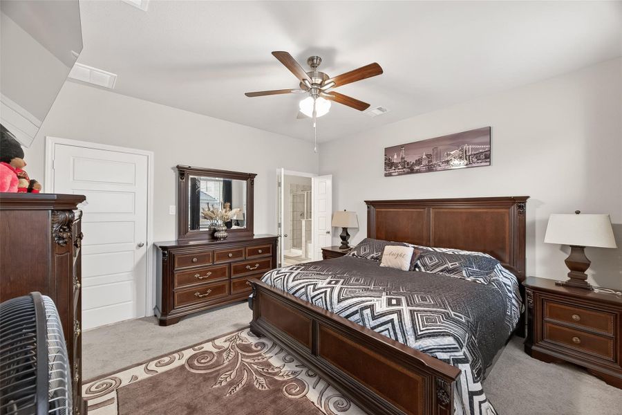 Furnished interior view inside a new home in Sunterra, Katy (Image 18).