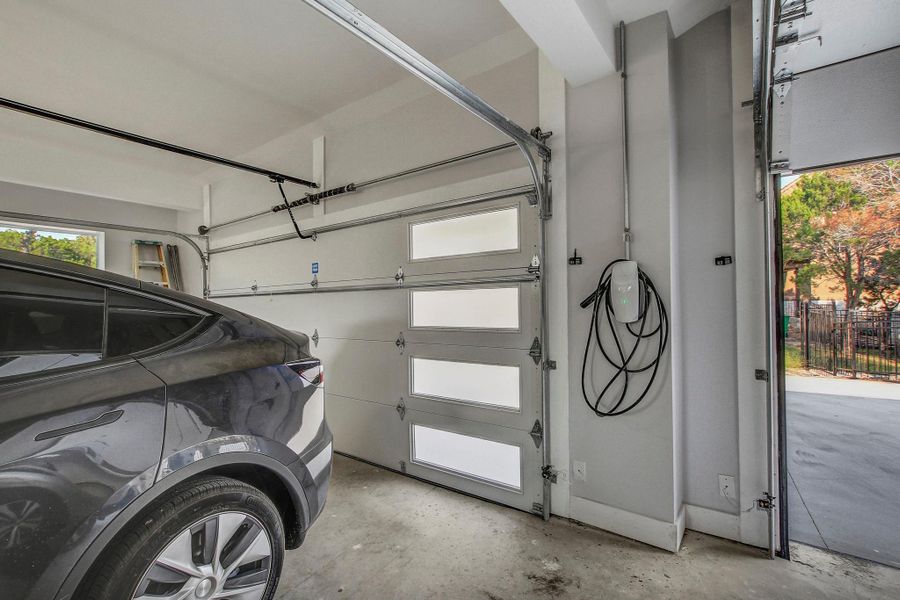 Garage featuring car charger