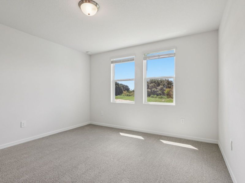 Spacious, unfurnished interior of a new home in Crosswinds - Signature Series, Haines City (Image 8).
