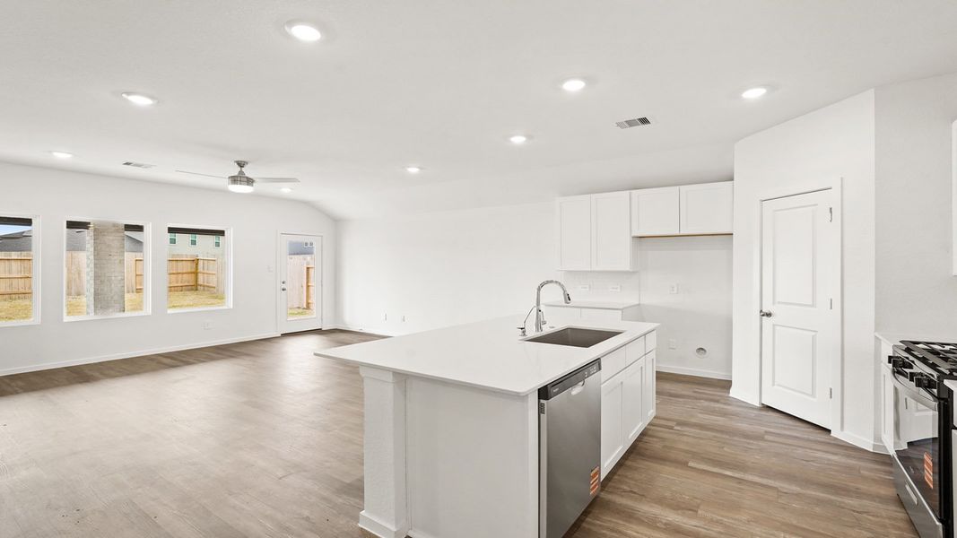 Furnished interior view inside a new home in Sunterra, Katy (Image 6).