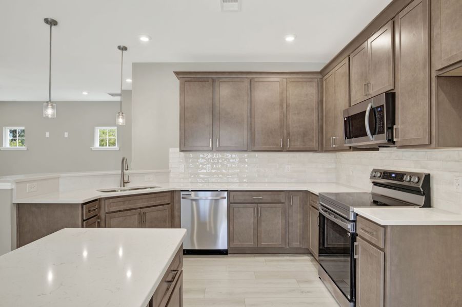 Aspen Plan Kitchen with Raised Bar and Island - Open Concept