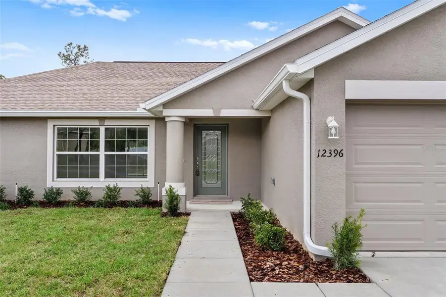 Exterior details and patio area of a home in , Weeki Wachee (Image 2). Exterior details and patio area of a home in , Weeki Wachee (Image 2).