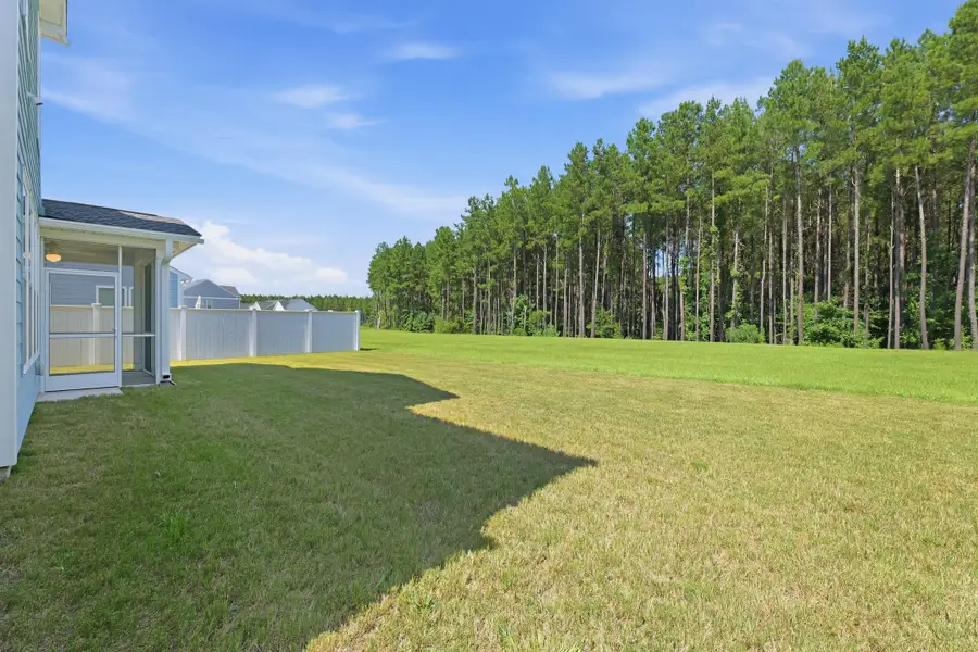 Exterior details and patio area of a home in , Ravenel (Image 3).