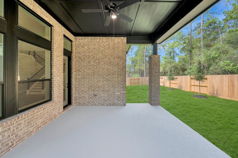 Exterior details and patio area of a home in The Woodlands Hills - Premier Collection, Willis (Image 4).