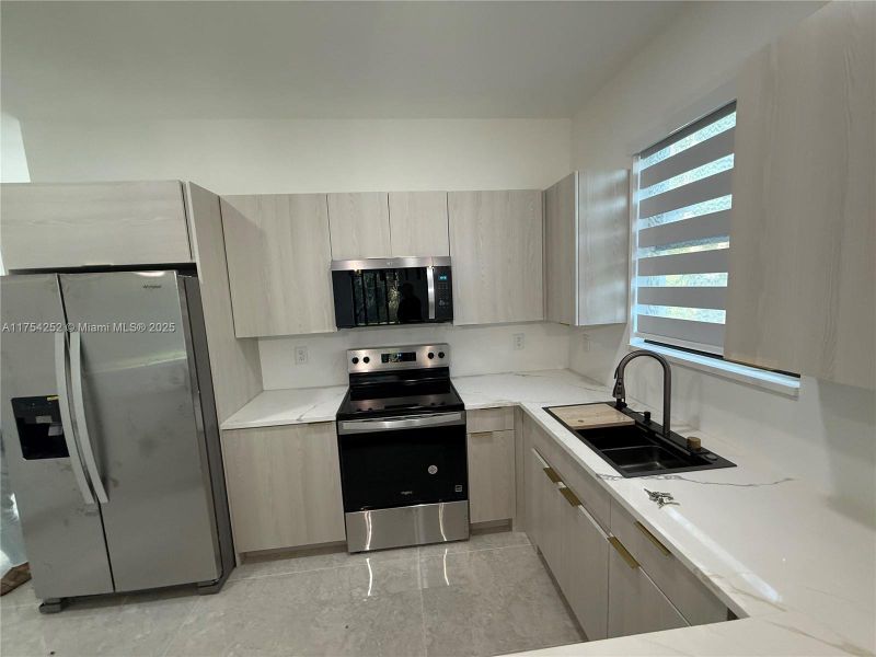 Furnished interior view inside a new home in , Punta Gorda (Image 5).