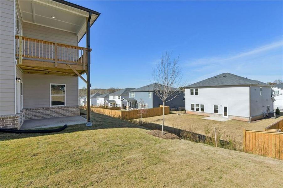 Exterior details and patio area of a home in Preserve at Mountain Creek, Pendergrass (Image 27).