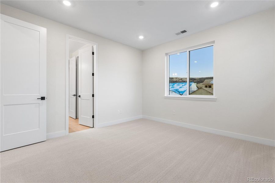 Spacious, unfurnished interior of a new home in Autograph at Lyric, Lone Tree (Image 37).