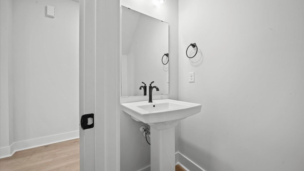 Representative furnished interior of a home built from the Kendrick - Finished Basement by DRB Homes in Pinebrook, Woodruff (Image 15).