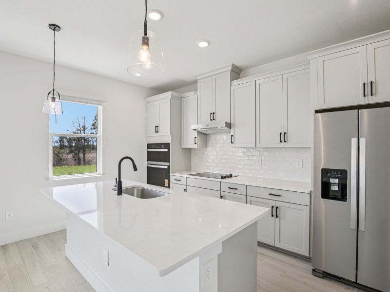 Furnished interior view inside a new home in Magnolia Bay - Reserve Series, Nokomis (Image 5).