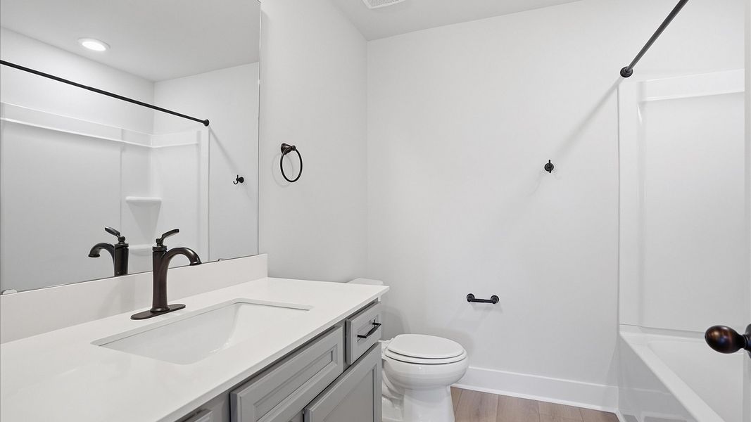 Accomplished full bath designed with both comfort and sophistication in mind located at Benjamin's Grove Accomplished full bath designed with both comfort and sophistication in mind located at Benjamin's Grove