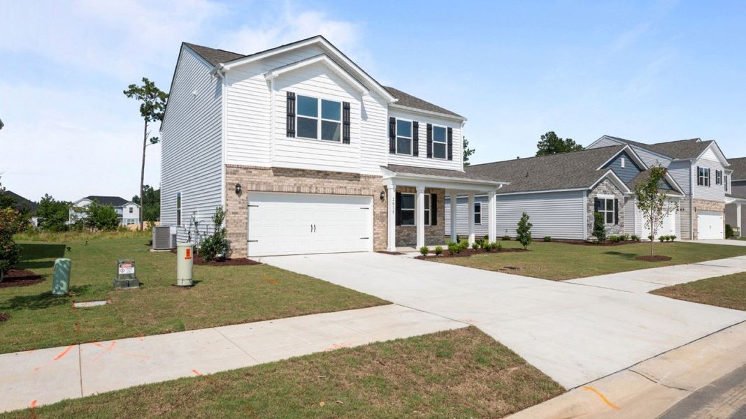 Front exterior of a new home in West New Bern, New Bern, NC, highlighting curb appeal (Image 14).