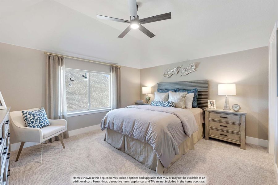 Bedroom with queen bed, ceiling fan, carpet flooring, and large window with natural light
