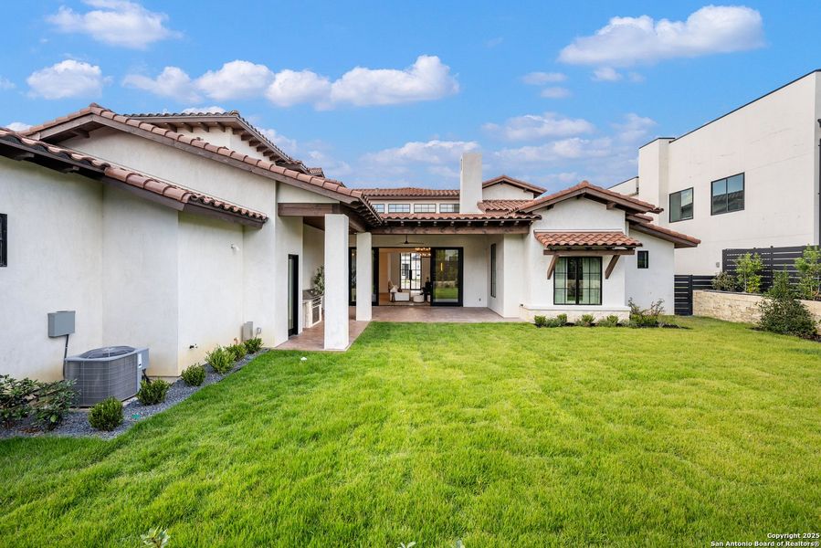 Exterior details and patio area of a home in , San Antonio (Image 2).