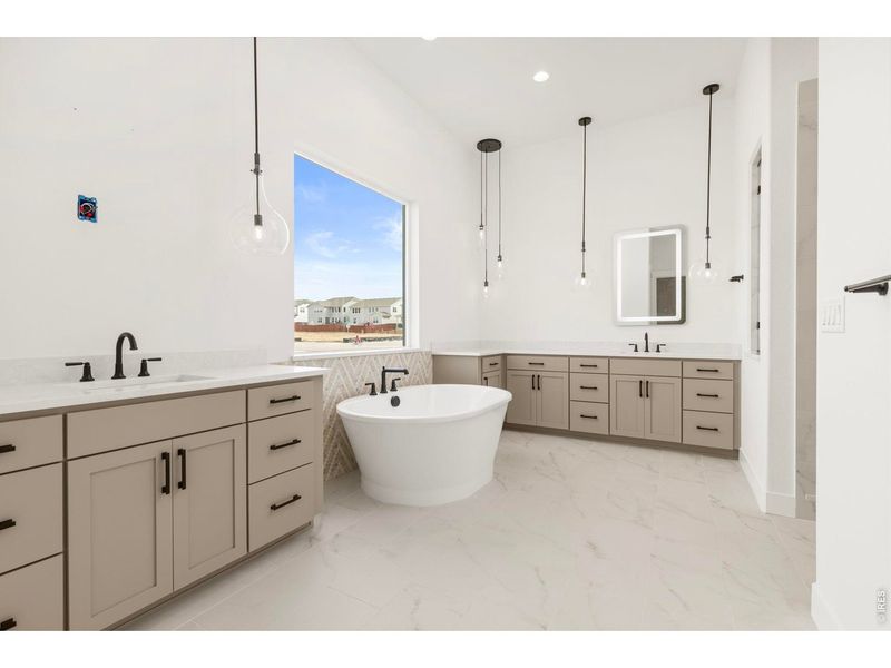 Furnished interior view inside a new home in RainDance, Windsor (Image 11).