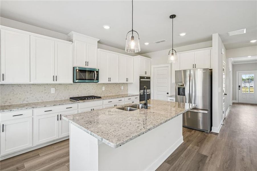 Furnished interior view inside a new home in Martin Springs - Estate Series, Lawrenceville (Image 4).