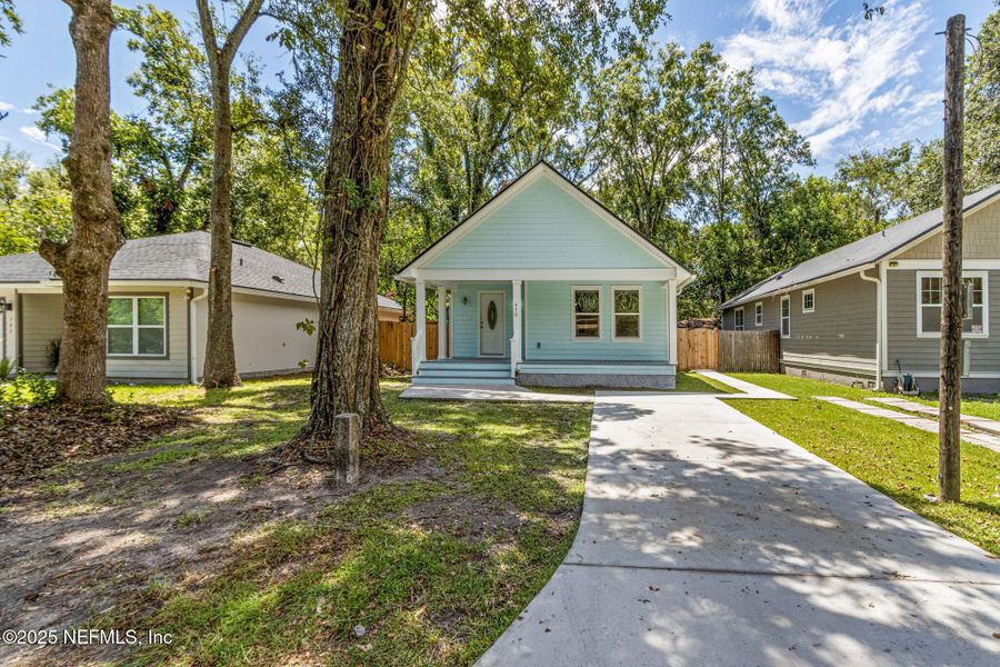 Front exterior of a new home in , Jacksonville, FL, highlighting curb appeal (Image 2).
