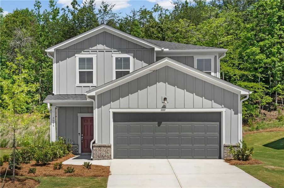 Front exterior of a new home in Avery Ridge, Gainesville, GA, highlighting curb appeal (Image 1). Front exterior of a new home in Avery Ridge, Gainesville, GA, highlighting curb appeal (Image 1).