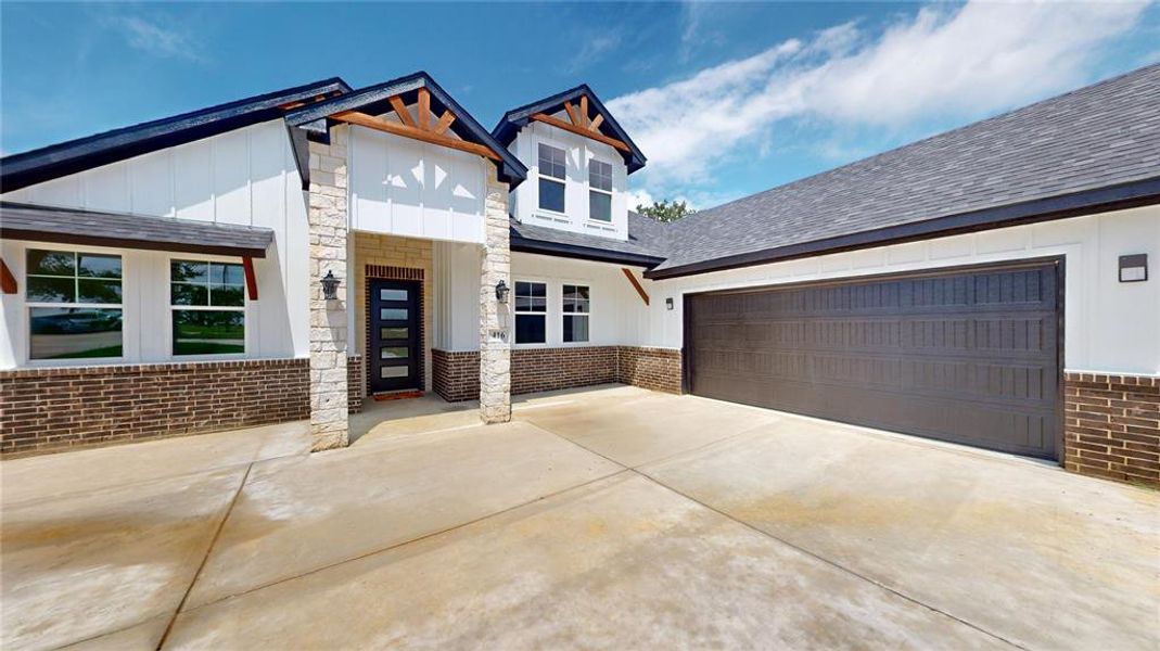 Front exterior of a new home in , Keene, TX, highlighting curb appeal (Image 1). Front exterior of a new home in , Keene, TX, highlighting curb appeal (Image 1).