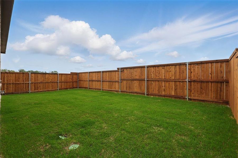 Exterior details and patio area of a home in Bel Air Village, Sherman (Image 21).