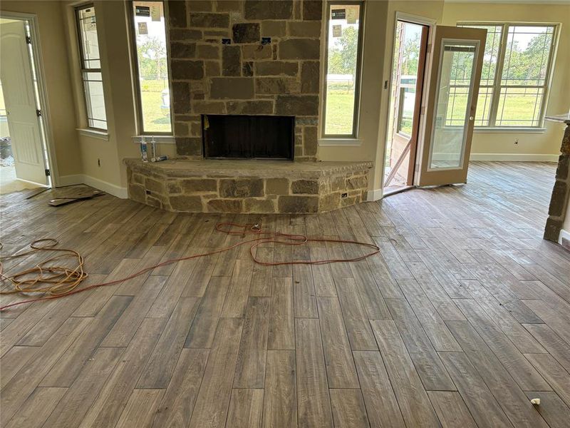 Beautiful hearth on this custom fireplace