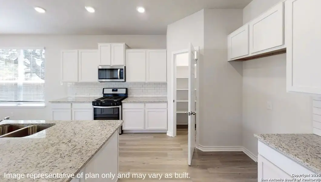 Furnished interior view inside a new home in Brookstone Creek, San Antonio (Image 4).
