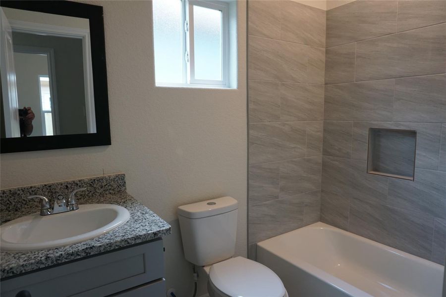 Furnished interior view inside a new home in , Willis (Image 8).