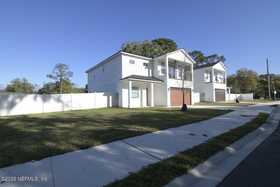 Front exterior of a new home in , Jacksonville, FL, highlighting curb appeal (Image 20).