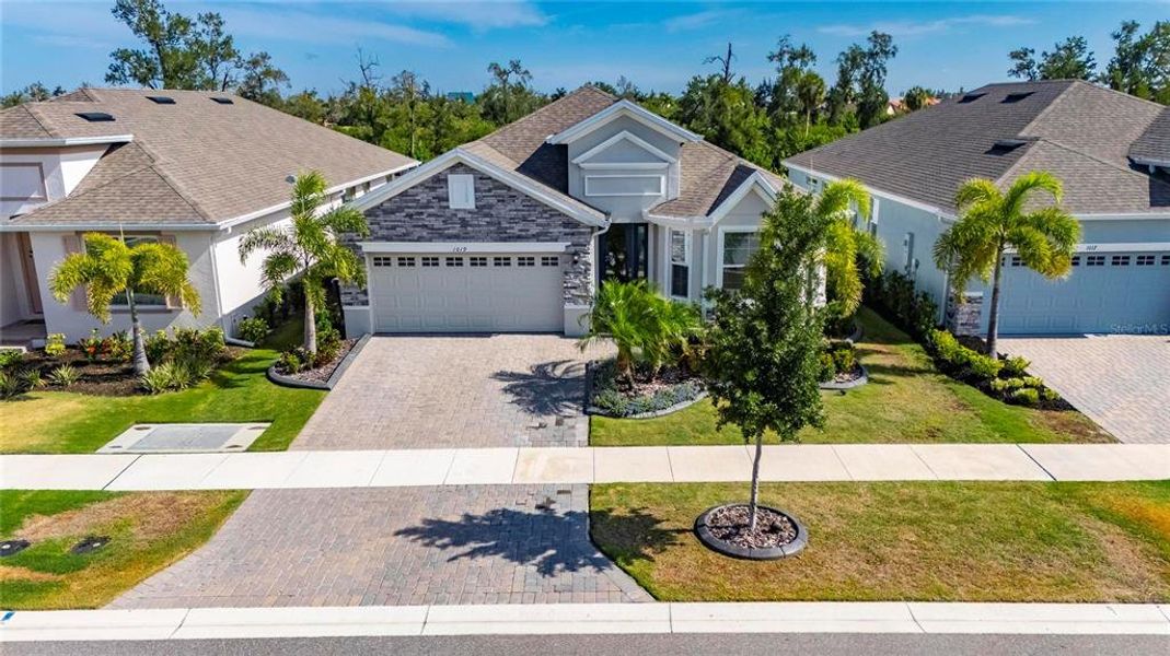 Front exterior of a new home in , Apollo Beach, FL, highlighting curb appeal (Image 28).