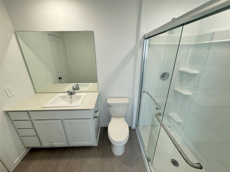 Furnished interior view inside a new home in Pinewood at Grand Texas, New Caney (Image 7).