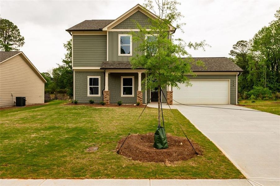 Front exterior of a new home in , Lawrenceville, GA, highlighting curb appeal (Image 16).