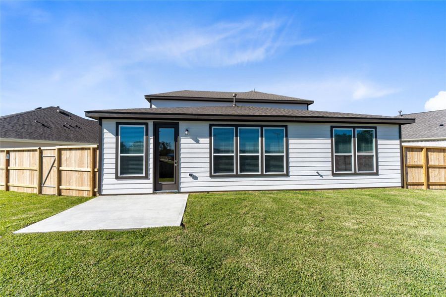 Come and see this spacious backyard. There is plenty of room for the kids to play and adults to relax!