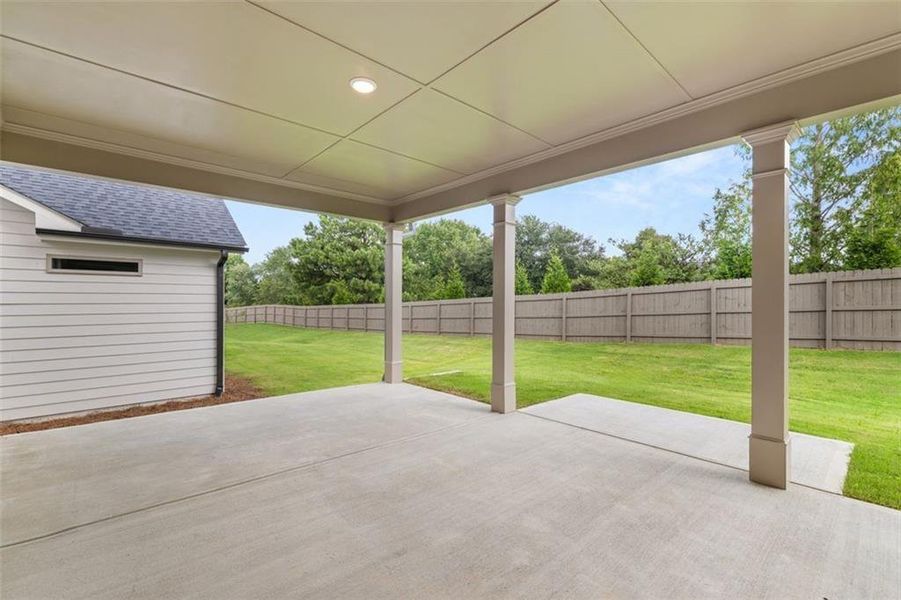 Exterior details and patio area of a home in Soleil Summit Chase, Snellville (Image 27).
