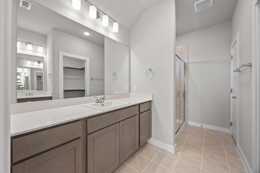 Primary Bathroom in the Cypress home plan by Trophy Signature Homes - REPRESENTATIVE PHOTO Primary Bathroom in the Cypress home plan by Trophy Signature Homes - REPRESENTATIVE PHOTO