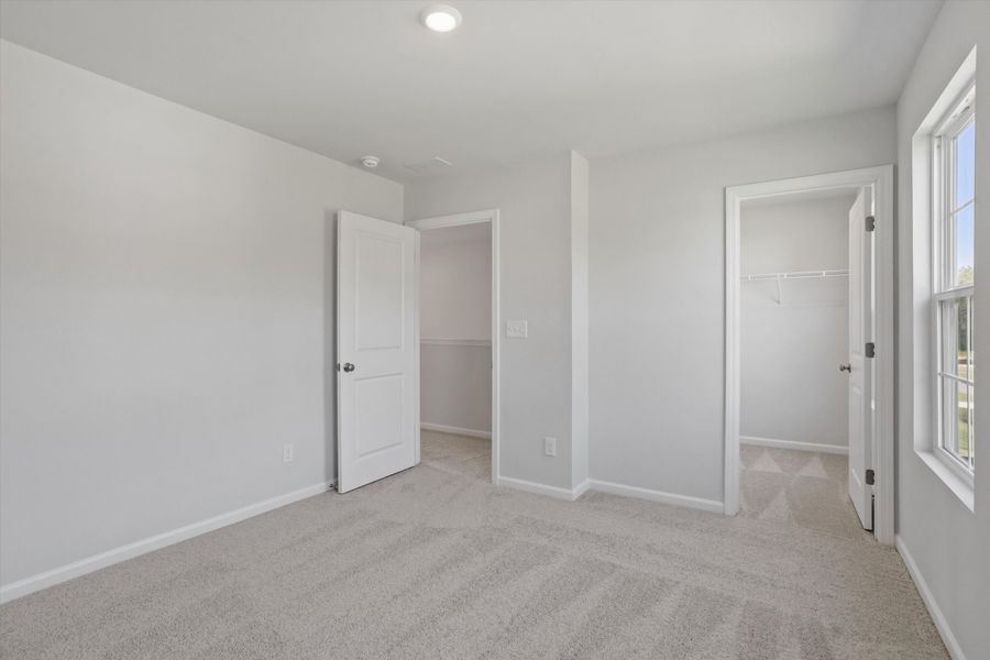 Spacious, unfurnished interior of a new home in Cambridge Reserve, Angier (Image 22).