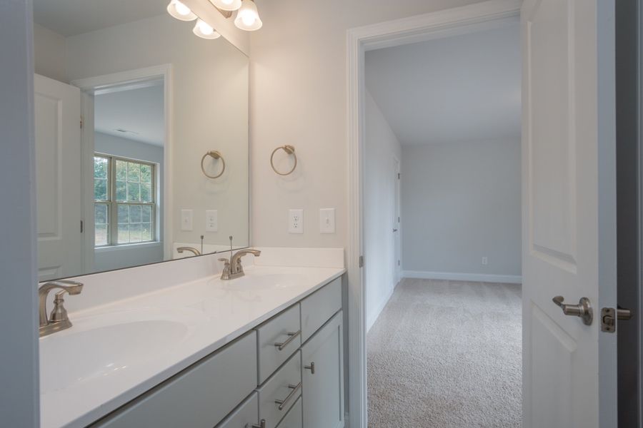 Representative furnished interior of a home built from the 3030 by Adams Homes in Parkland Place, Pace (Image 15).